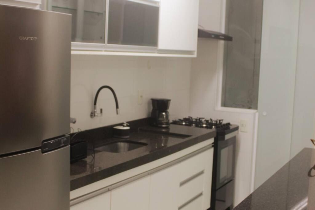 Ap Confortavel Guaruja - Enseada Bagian luar foto